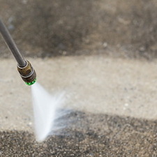 Driveway Algae & Oil Stains: How Professional Cleaning Restores Concrete Fast